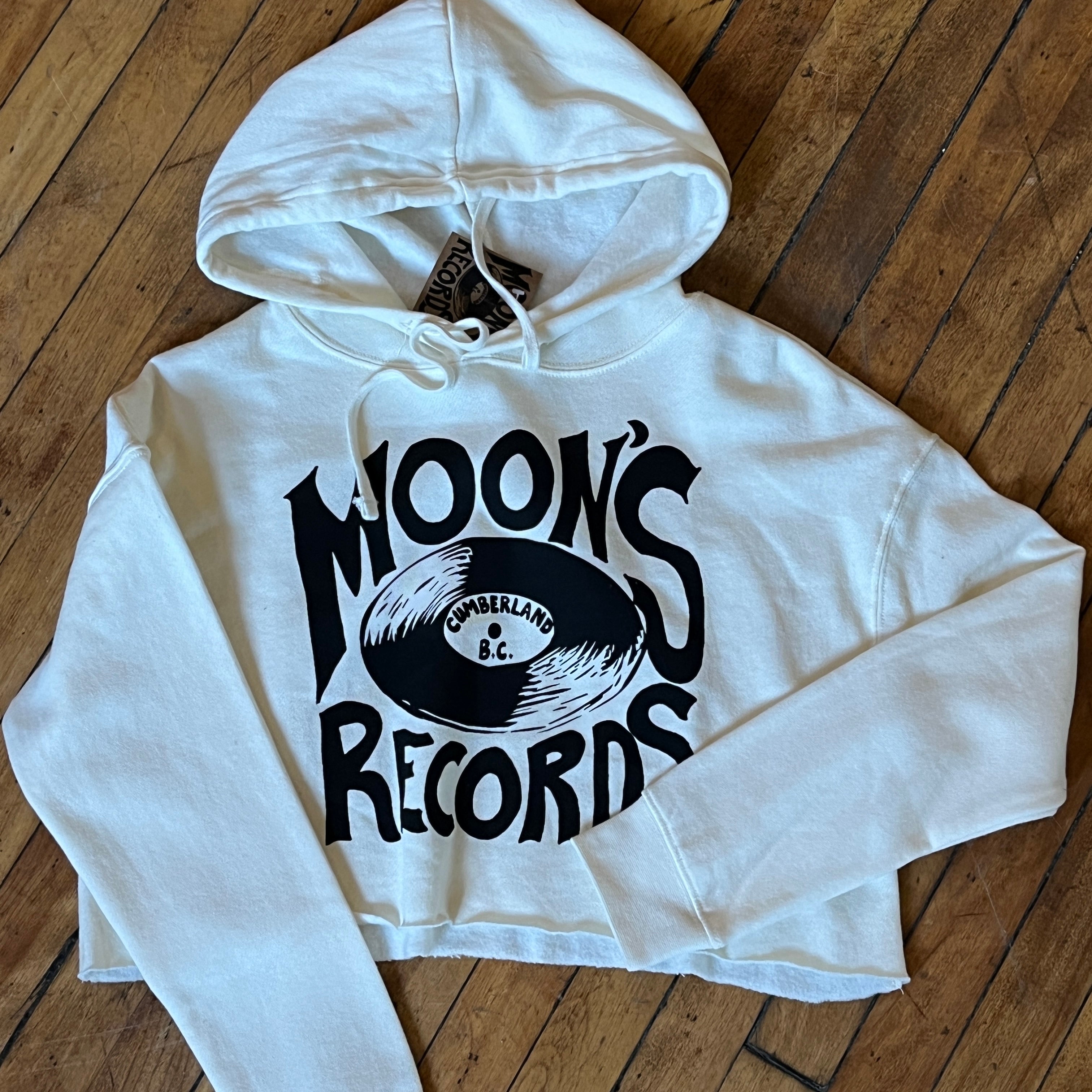 relaxed fit crop hoody with moon's records logo on it.