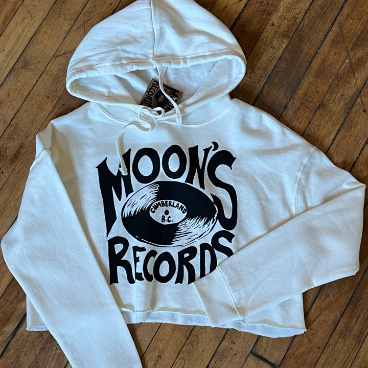 relaxed fit crop hoody with moon's records logo on it.