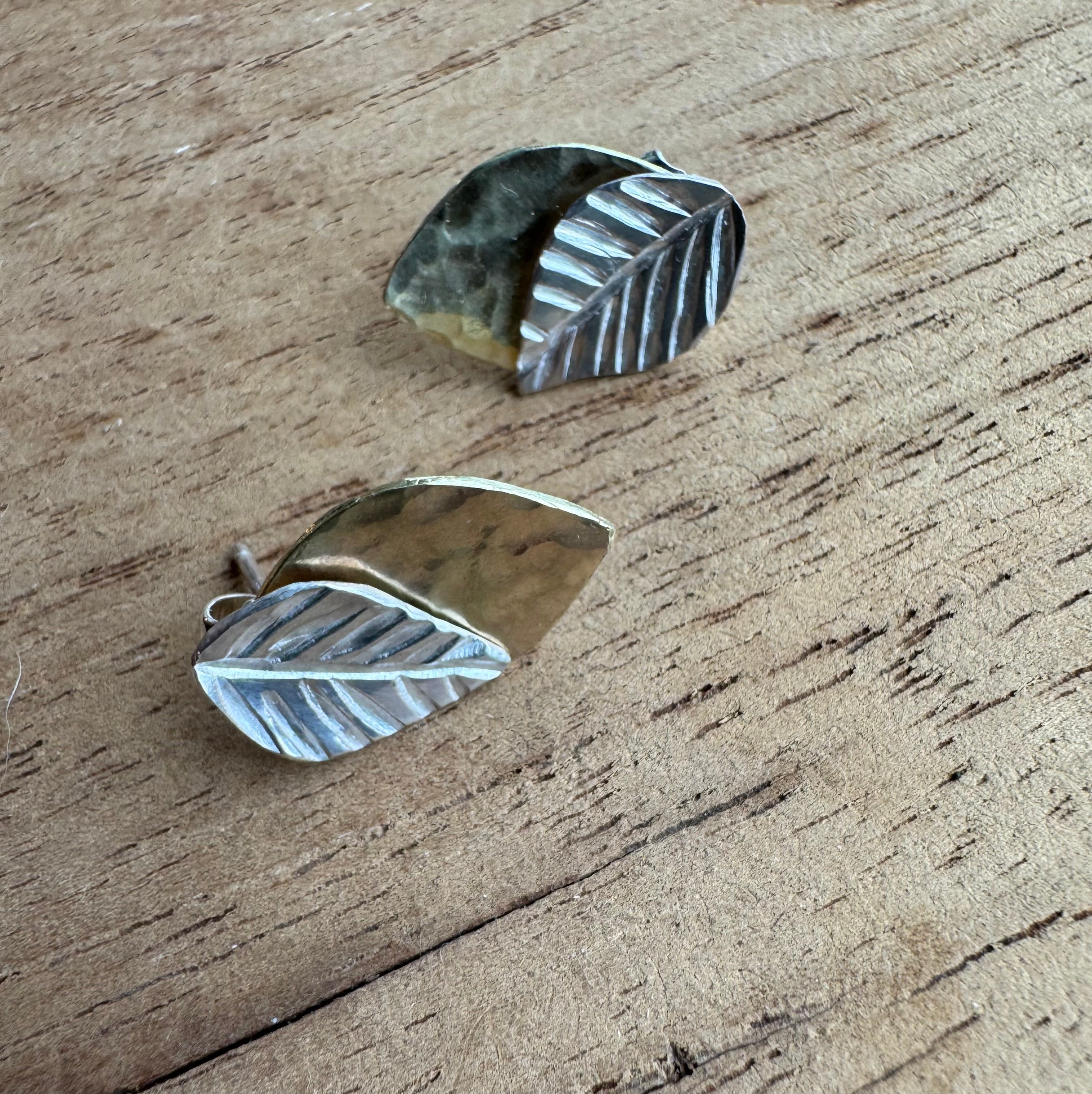 Handcrafted sterling silver & brass leaf earring jackets. Layered design with a stamped silver front & hammered brass back for a unique, nature-inspired look.