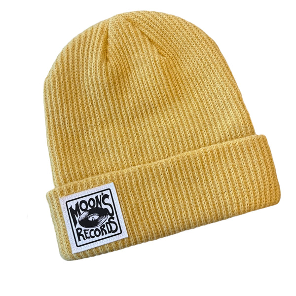 Stay warm in style with the Moon's Records logo toque. A cozy beanie featuring our iconic logo, perfect for vinyl enthusiasts and cold-weather fashion