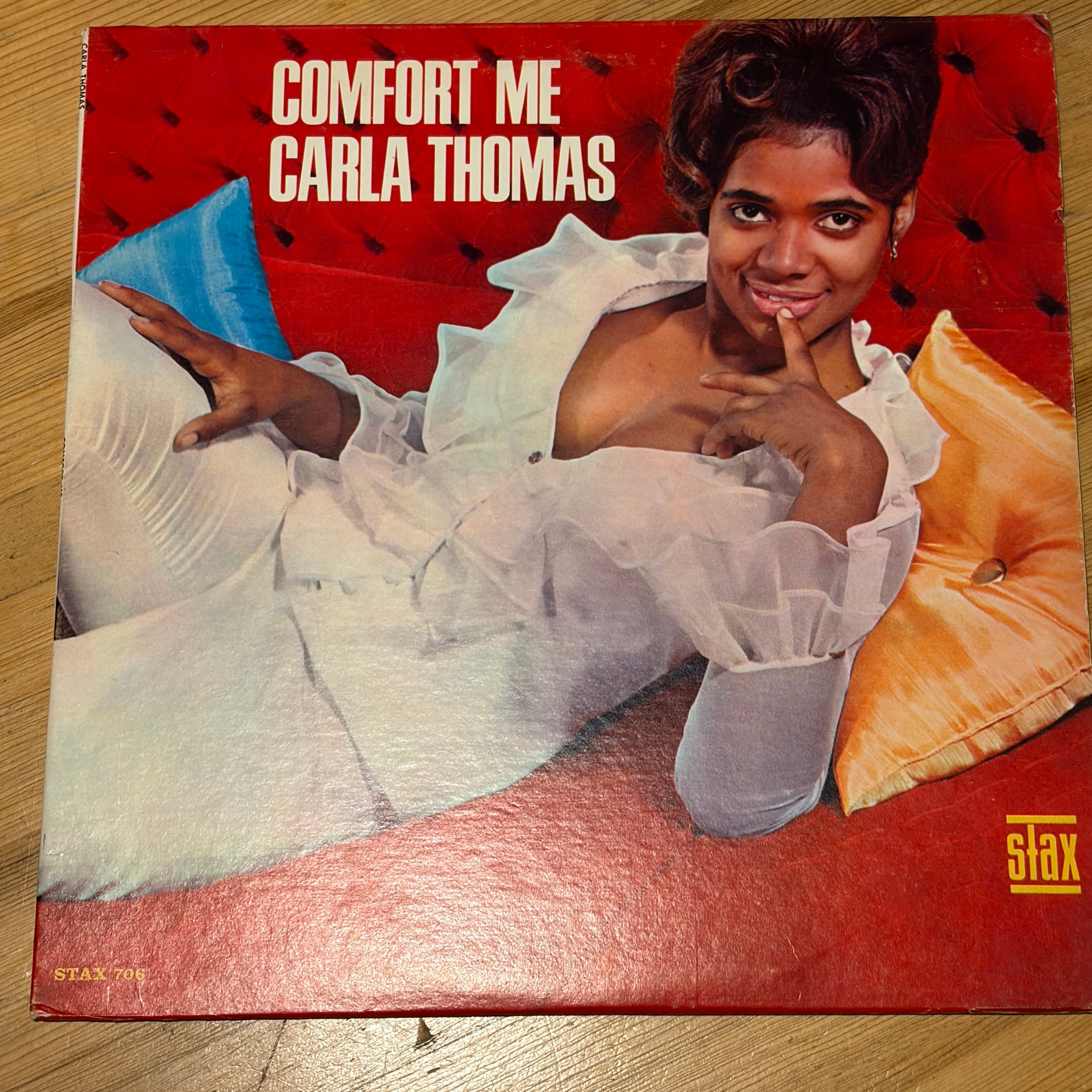 Vinyl record cover featuring a woman on a bed with 'Comfort Me' by Carla Thomas and Stax logo.