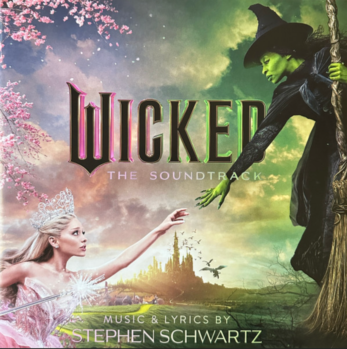 Album cover for 'Wicked: The Soundtrack' featuring a witch and a fairy in a fantasy setting.
