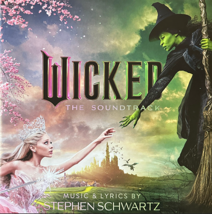 Album cover for 'Wicked: The Soundtrack' featuring a witch and a fairy in a fantasy setting.