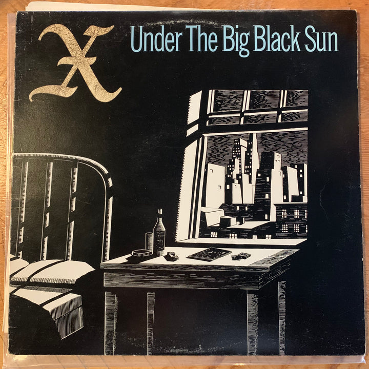 X - UNDER THE BIG BLACK SUN