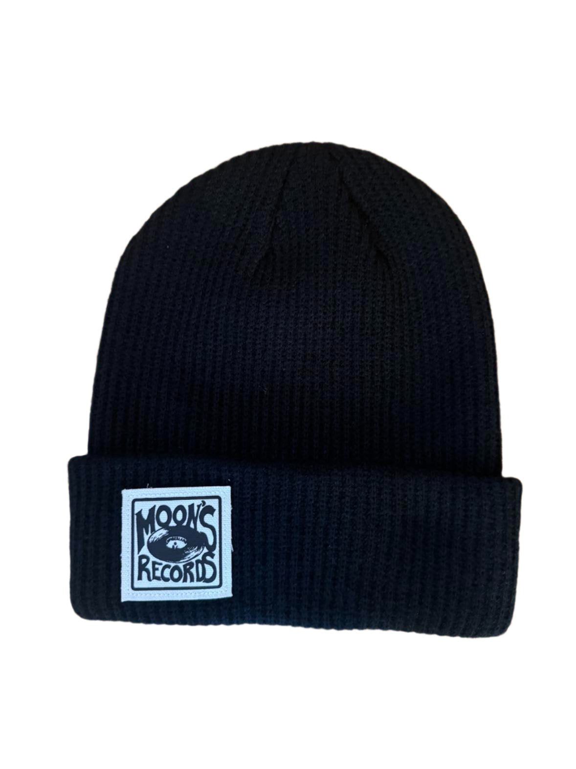 Stay warm in style with the Moon's Records logo toque. A cozy beanie featuring our iconic logo, perfect for vinyl enthusiasts and cold-weather fashion